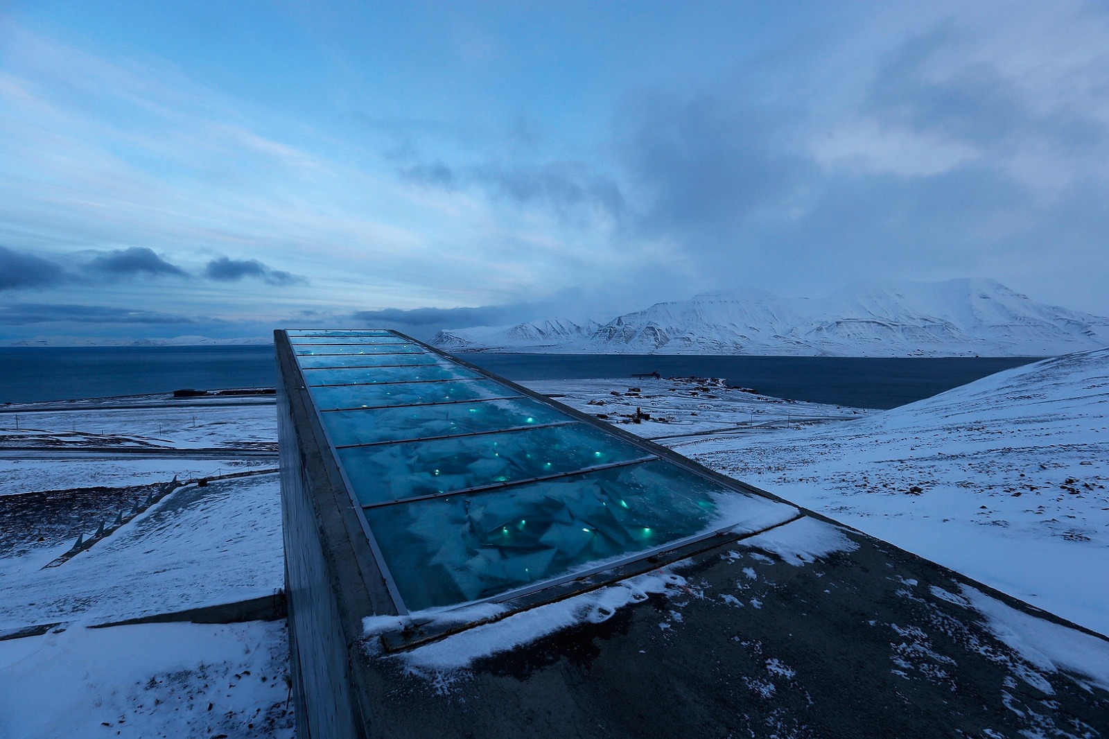 Background photo of the Svalbard Global Seed Vault located on an Norwegian Island
